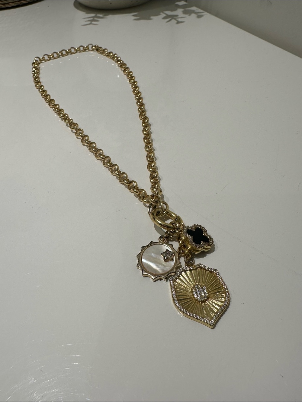 Linda Mikhail gold necklace